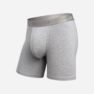 Light gray heathered boxer briefs with a matching gray waistband featuring the brand name BN3TH, shown on a light gray background. Essentials Boxer Brief: Heather Gray