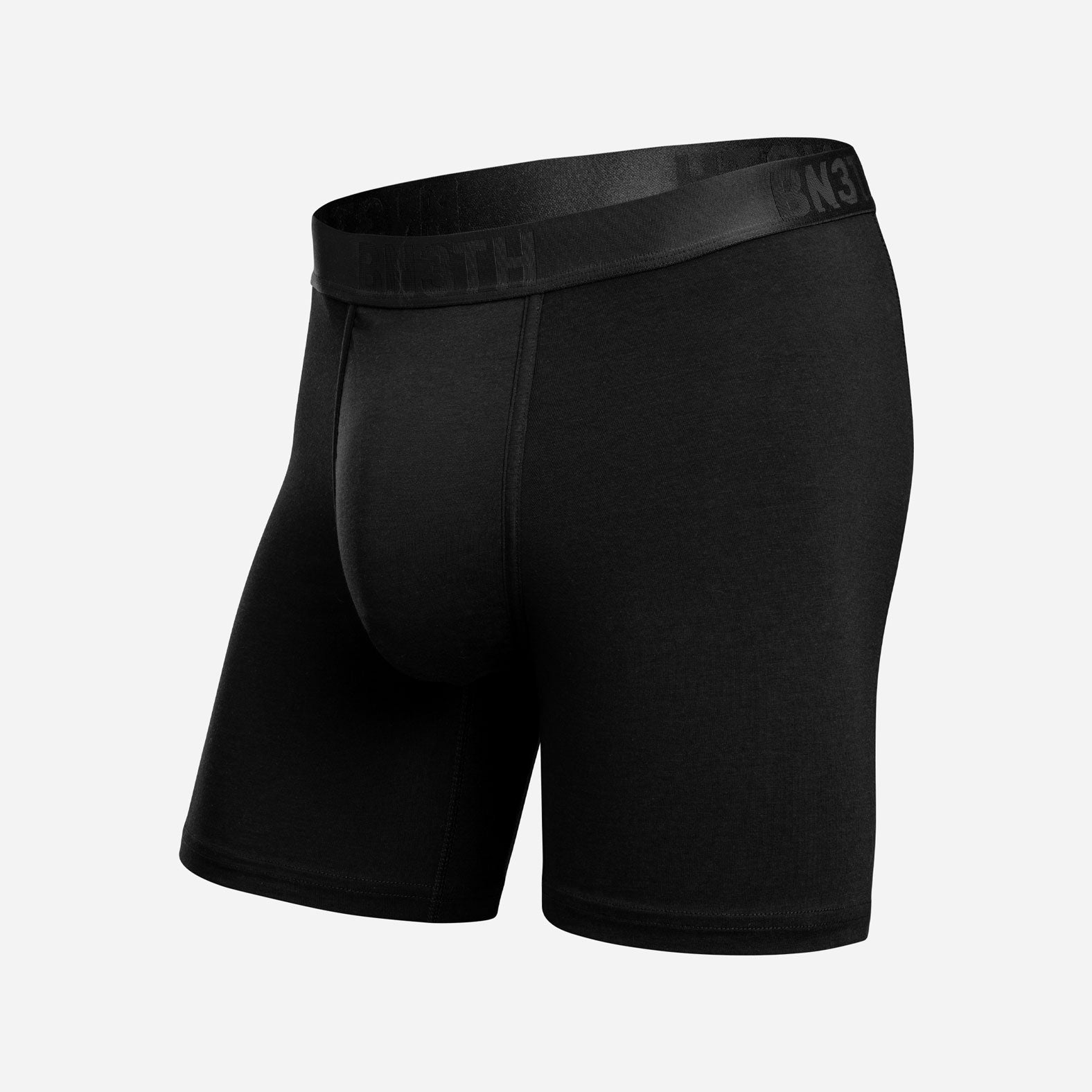 Black men's boxer briefs with a wide elastic waistband, shown on a light gray background. Essentials Boxer Brief: Black